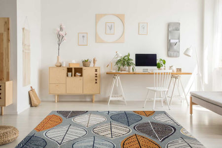 Dywan dla dzieci i dorosłych w beżowe, niebieskie i pomarańczowe listki nowoczesny styl