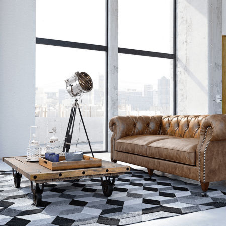 Designerska lampa FUTURIS chromowana z czarnymi nóżkami, nowoczesny kształt