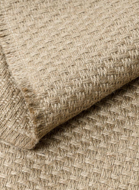 Pleciony dywan boho z juty w kolorze beżowym, z frędzlami, płasko tkany, naturalny - JUTE