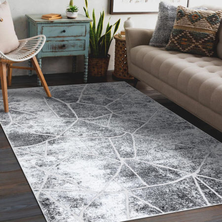 Nowoczesny, strukturalny, ciemnoszary dywan marmurowy z jasnymi pęknięciami